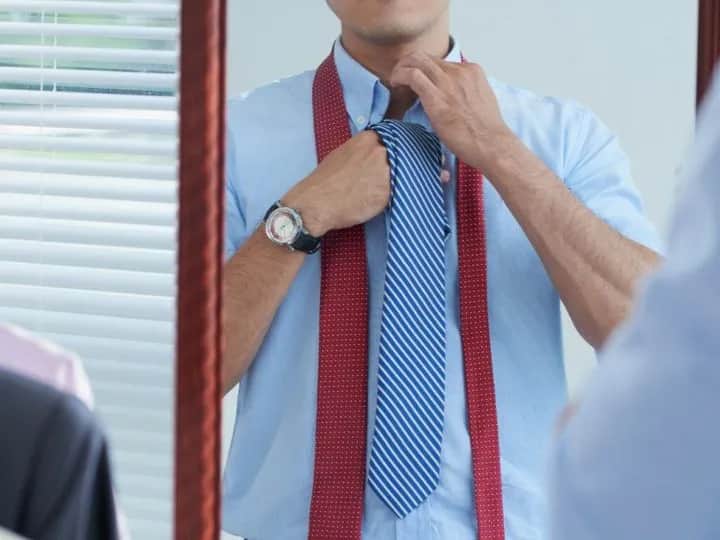 Dowiedz się dokąd ma sięgać krawat: zasady elegancji i dobrego stylu